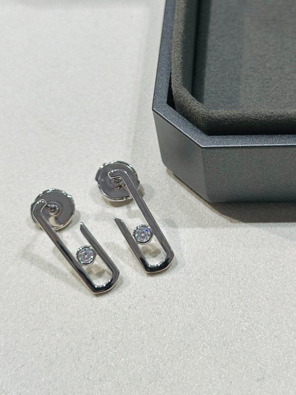 Messika Silver Drop Earrings with SingleDiamond Accent